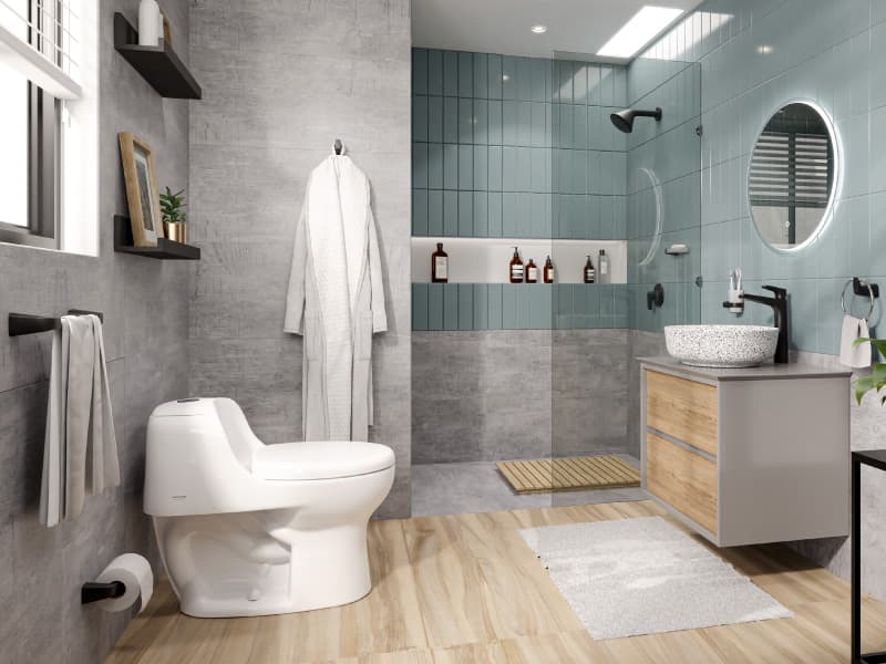 Baño gris y azul con accesorios negros